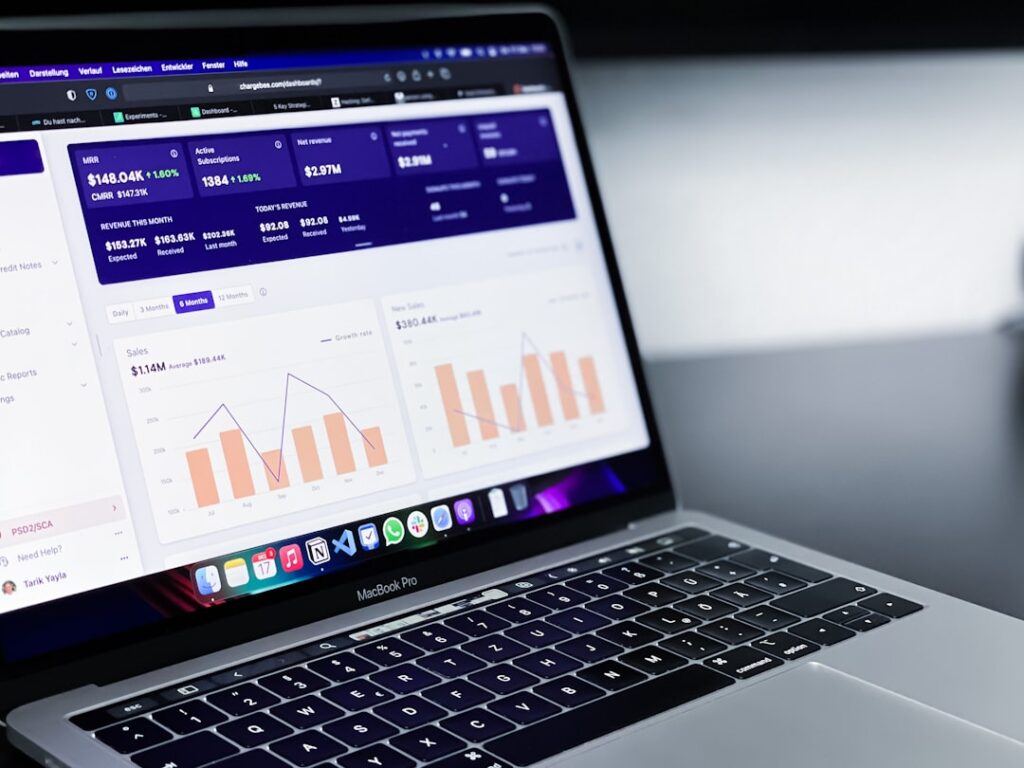 SaaS product analytics dashboard displayed on a MacBook, illustrating the kind of UI-forward design that top SaaS landing pages showcase in their hero sections.